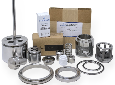 Various Fisher spare parts, including seals, gaskets, trim components, and actuators, organized and ready for industrial use.