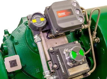 Close-up of a Fisher DVC6200 digital valve controller installed on a Bettis actuator, showcasing precise control and integration in industrial automation.