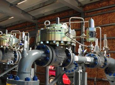 Fisher EZH pressure regulator installed in an industrial environment, providing reliable pressure control for optimal system performance.